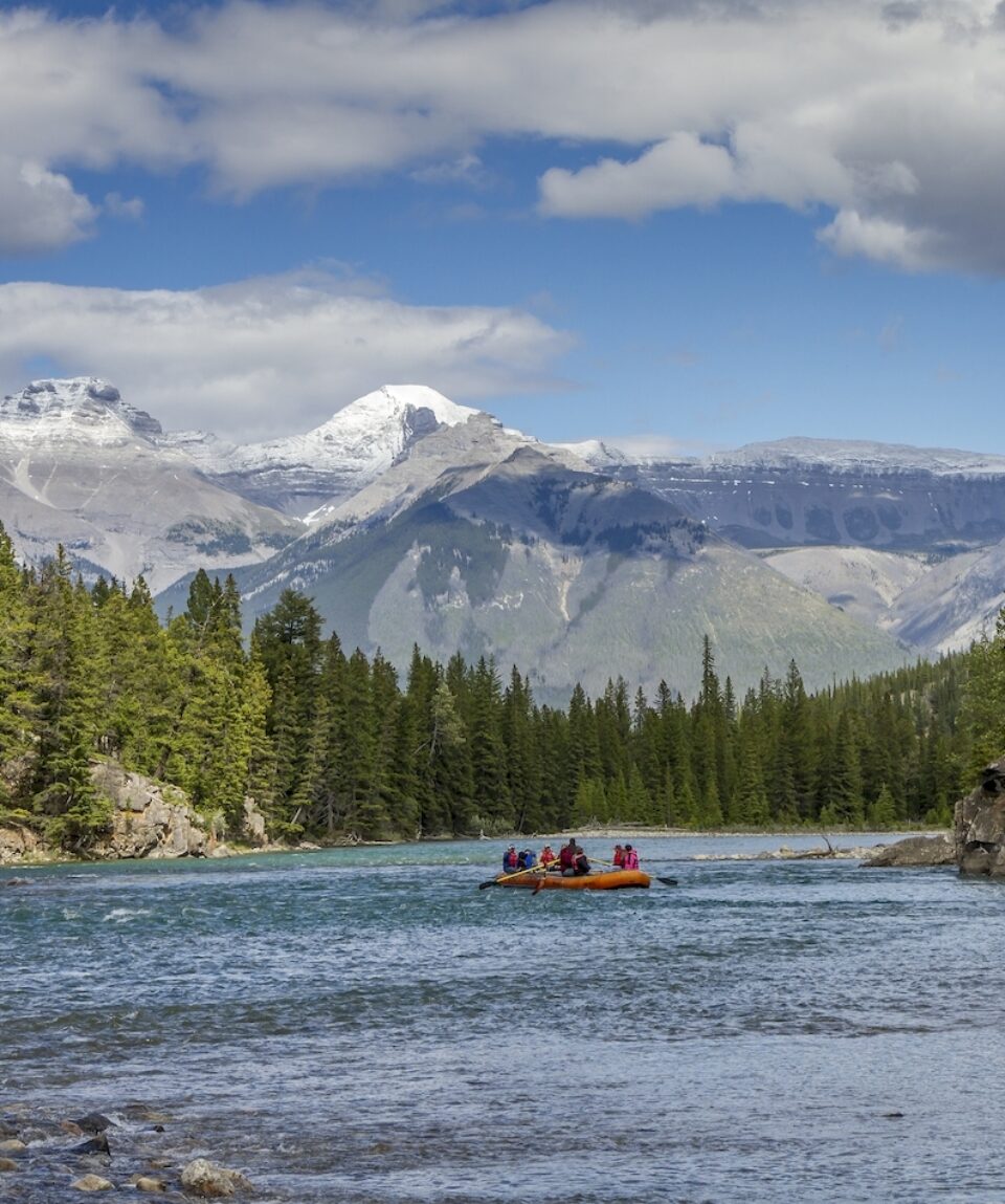 River float on the Athabasca River with the Rocky Mountains in the background - Jasper National Park